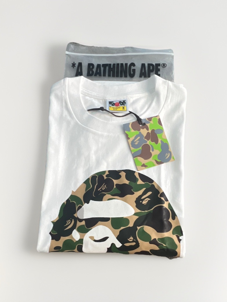 Bape White Tee With Green  Brown Camo Ape Tag